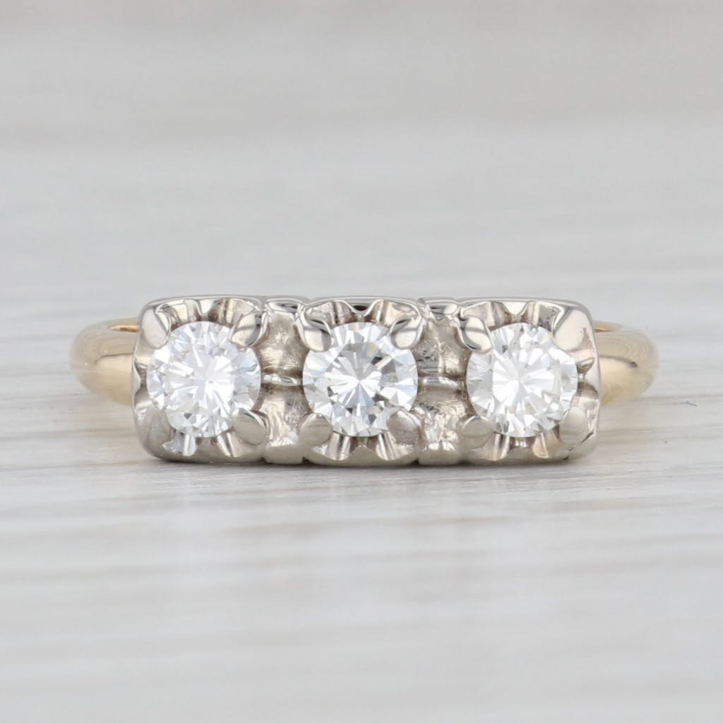 Light Gray Vintage 0.55ctw VS2 3-Stone Diamond Ring 14k Gold Size 7.25