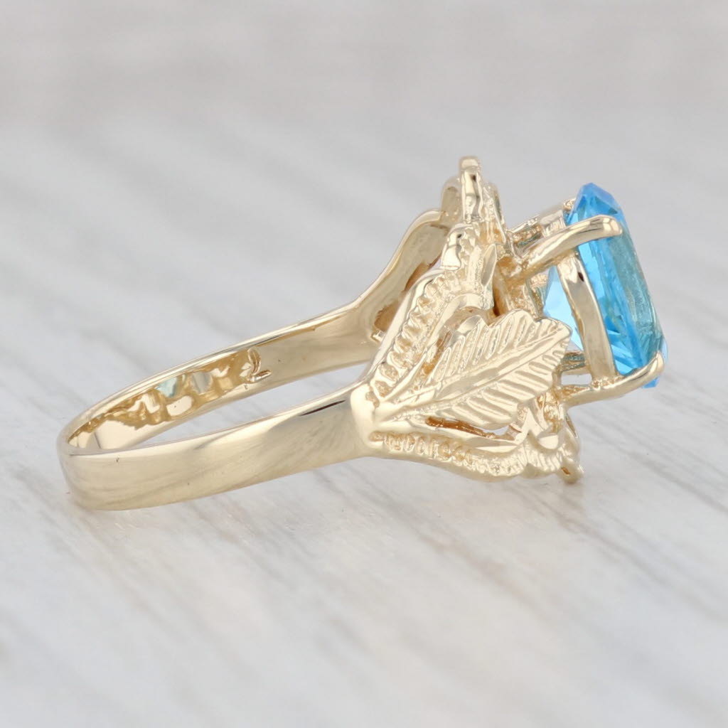 Light Gray 1.48ct Oval Blue Topaz Solitaire Floral Ring 14k Yellow Gold Size 7