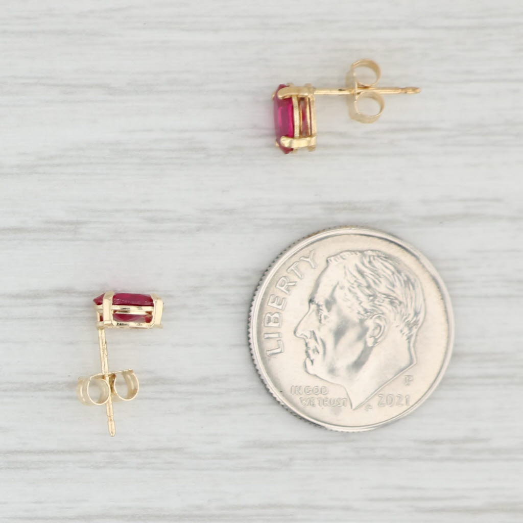 Light Gray 1.10ctw Lab Created Ruby Stud Earrings 14k Yellow Gold July Birthstone