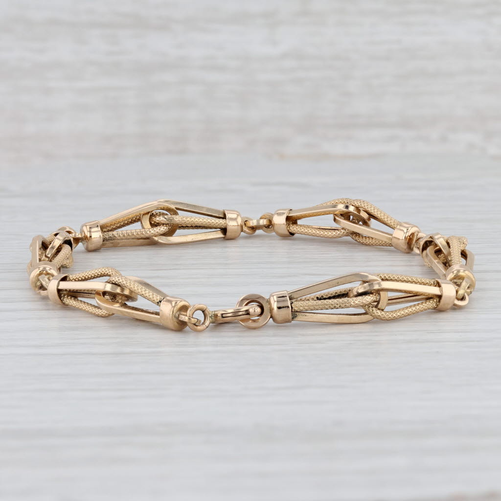 Light Gray 7.75" Ornate Linked Bracelet 18k Yellow Gold 7mm Italian