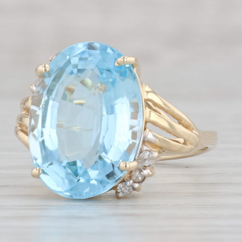 Light Gray 10.29ctw Oval Blue Topaz Diamond Ring 14k Yellow Gold Size 7.25 Bypass