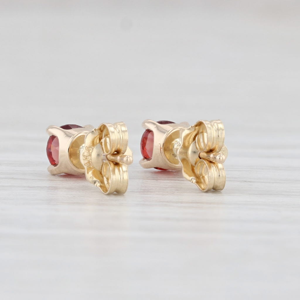 Light Gray New 0.61ctw Round Garnet Stud Earrings 14k Yellow Gold January Birthstone