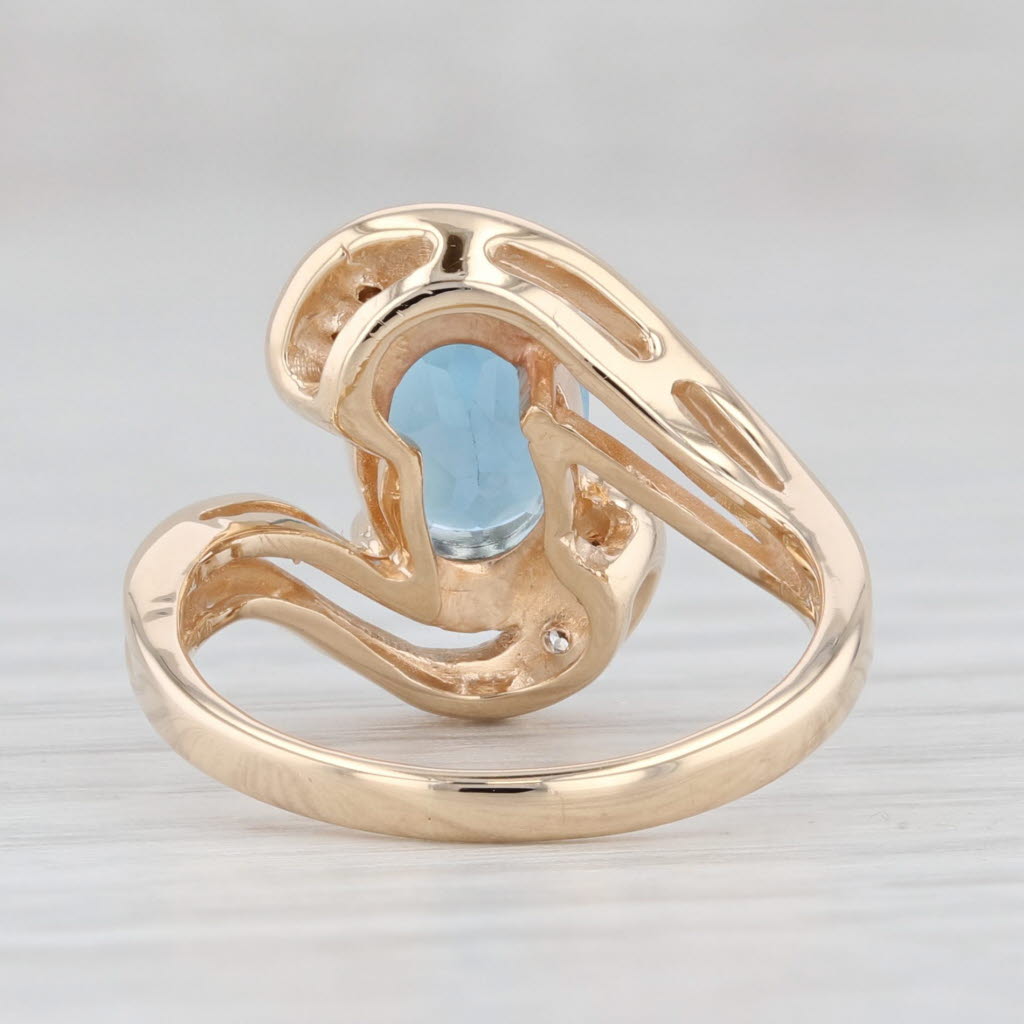 Light Gray 1.51ctw Oval Blue Topaz Diamond Bypass Ring 14k Yellow Gold Size 4.5