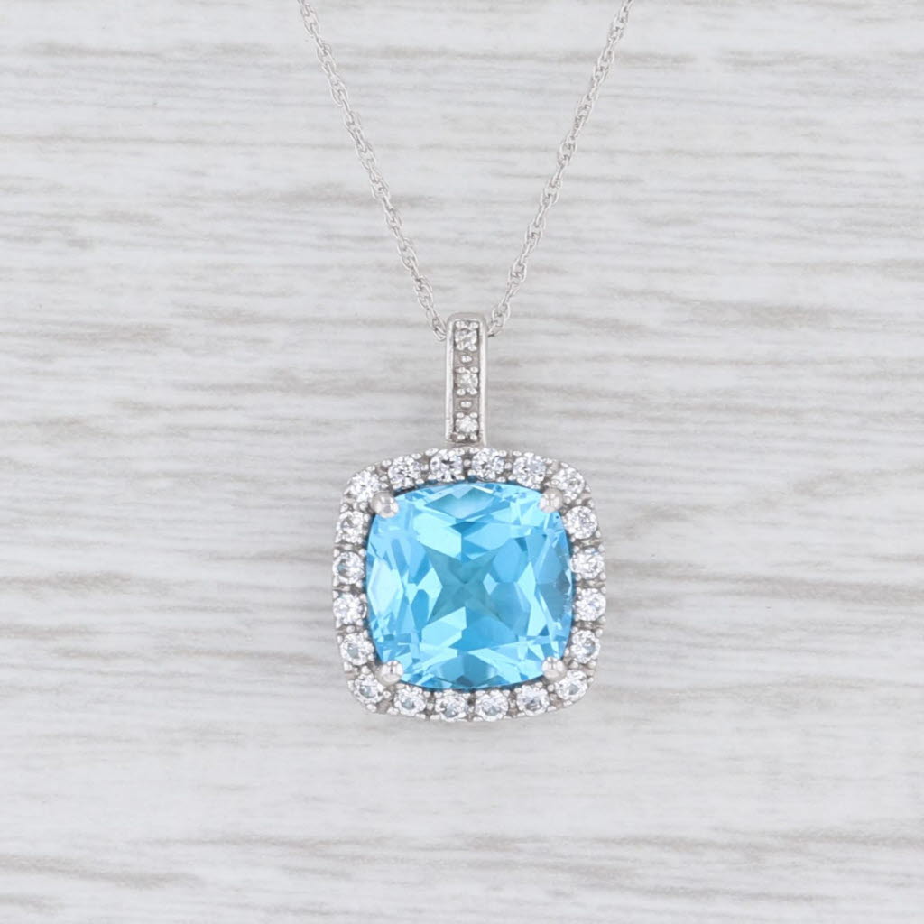 Light Gray New 4.19ctw Blue Topaz Synthetic White Sapphire Halo Pendant Necklace 10k Gold