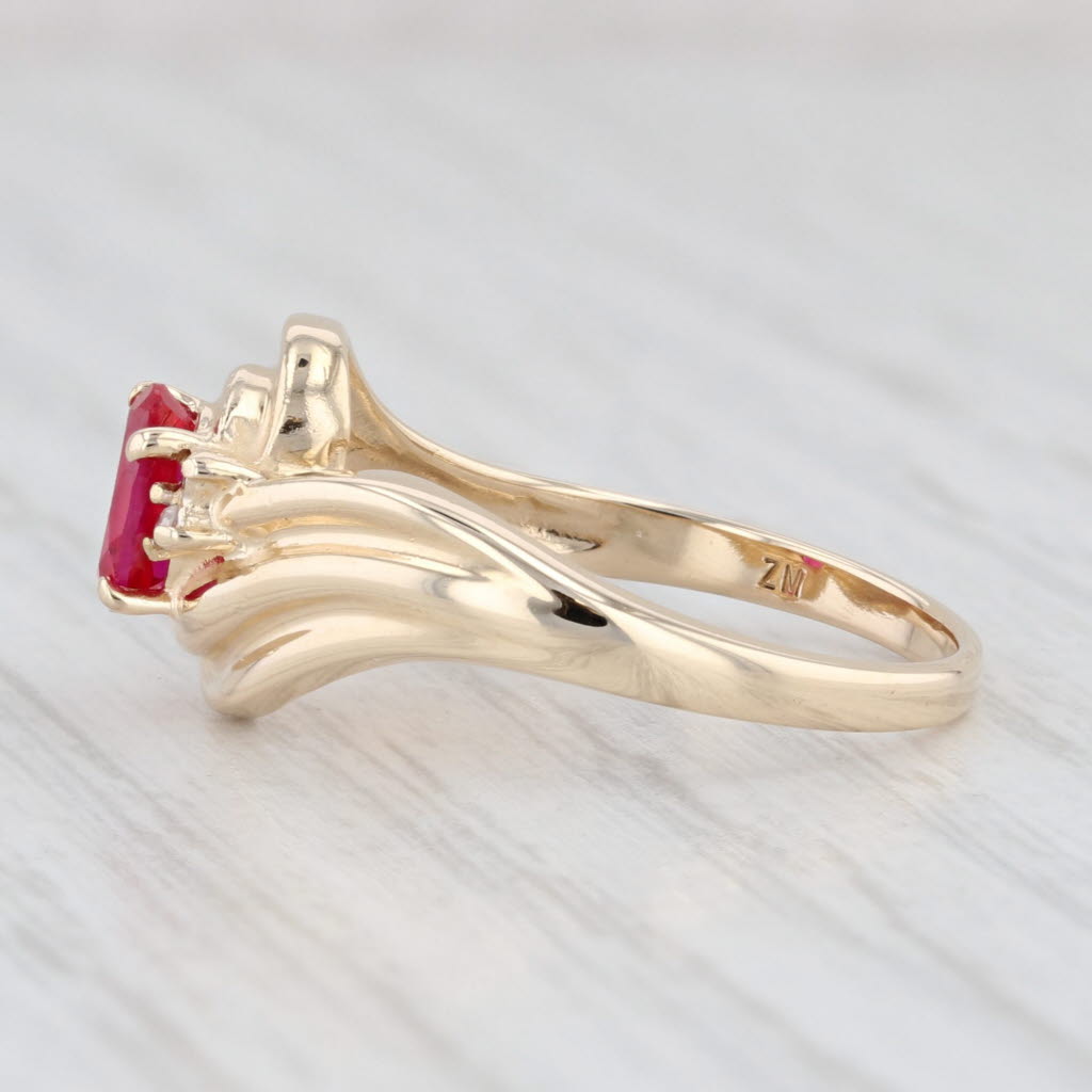 Light Gray 0.60ct Oval Lab Created Ruby Bypass Ring 10k Yellow Gold Size 6.5 Diamonds