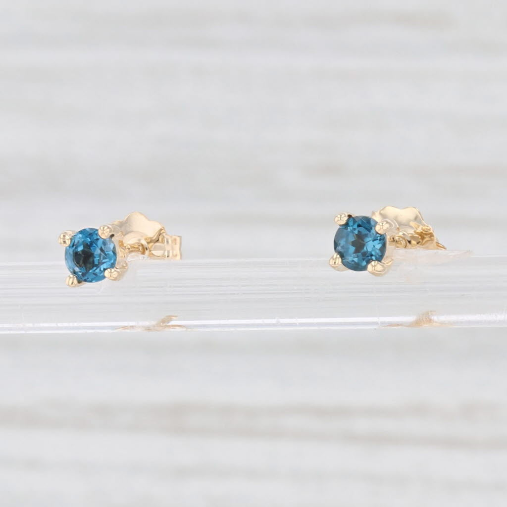 Light Gray New 0.28ctw London Blue Topaz Stud Earrings 14k Yellow Gold Round Solitaires