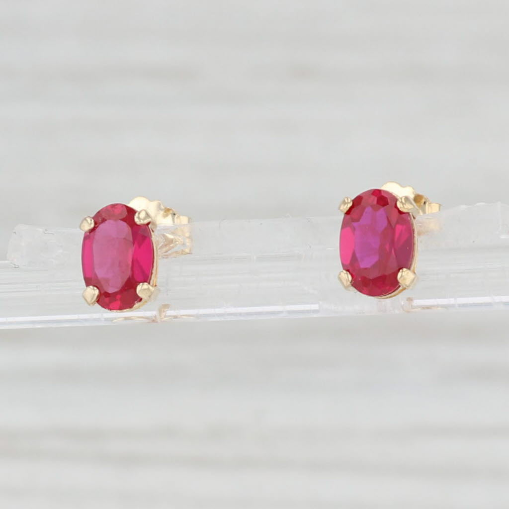 Light Gray 1.10ctw Lab Created Ruby Stud Earrings 14k Yellow Gold July Birthstone