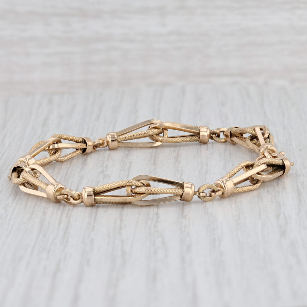 Light Gray 7.75" Ornate Linked Bracelet 18k Yellow Gold 7mm Italian