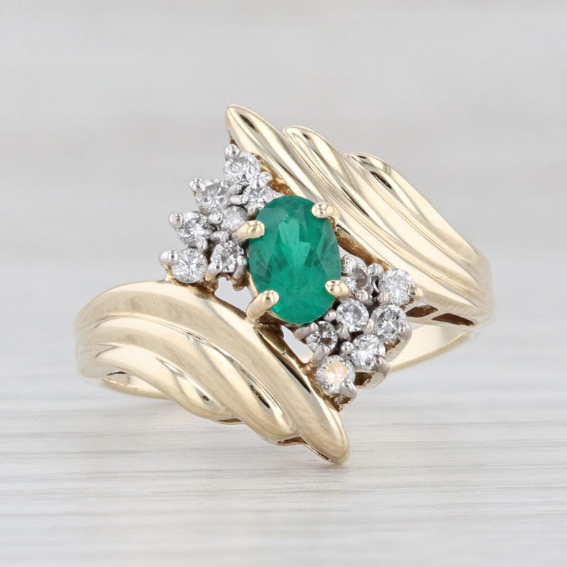 Light Gray 0.69ctw Oval Lab Created Emerald Diamond Bypass Ring 14k Yellow Gold Size 7.5