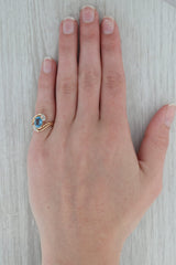 Rosy Brown 1.51ctw Oval Blue Topaz Diamond Bypass Ring 14k Yellow Gold Size 4.5