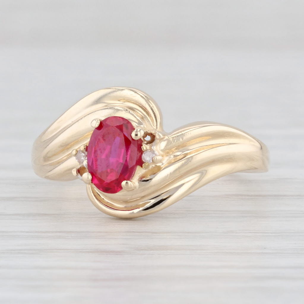 Light Gray 0.60ct Oval Lab Created Ruby Bypass Ring 10k Yellow Gold Size 6.5 Diamonds