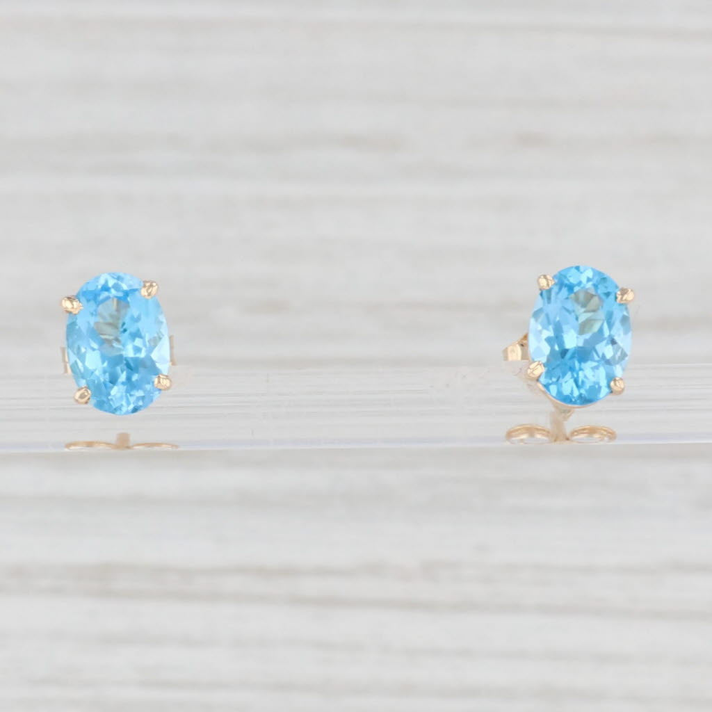 Light Gray 2.10ctw Oval Blue Topaz Solitaire Stud Earrings 14k Yellow Gold Pierced Studs