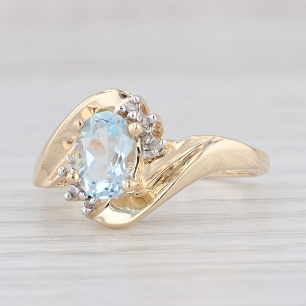 Light Gray 0.66ct Oval Blue Topaz Diamond Bypass Ring 14k Yellow Gold Size 6.5